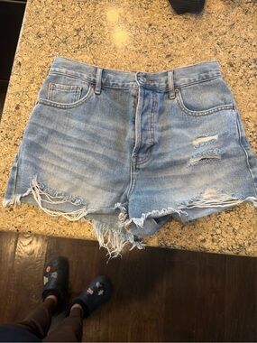 Light Blue Distressed Denim Shorts - Women's